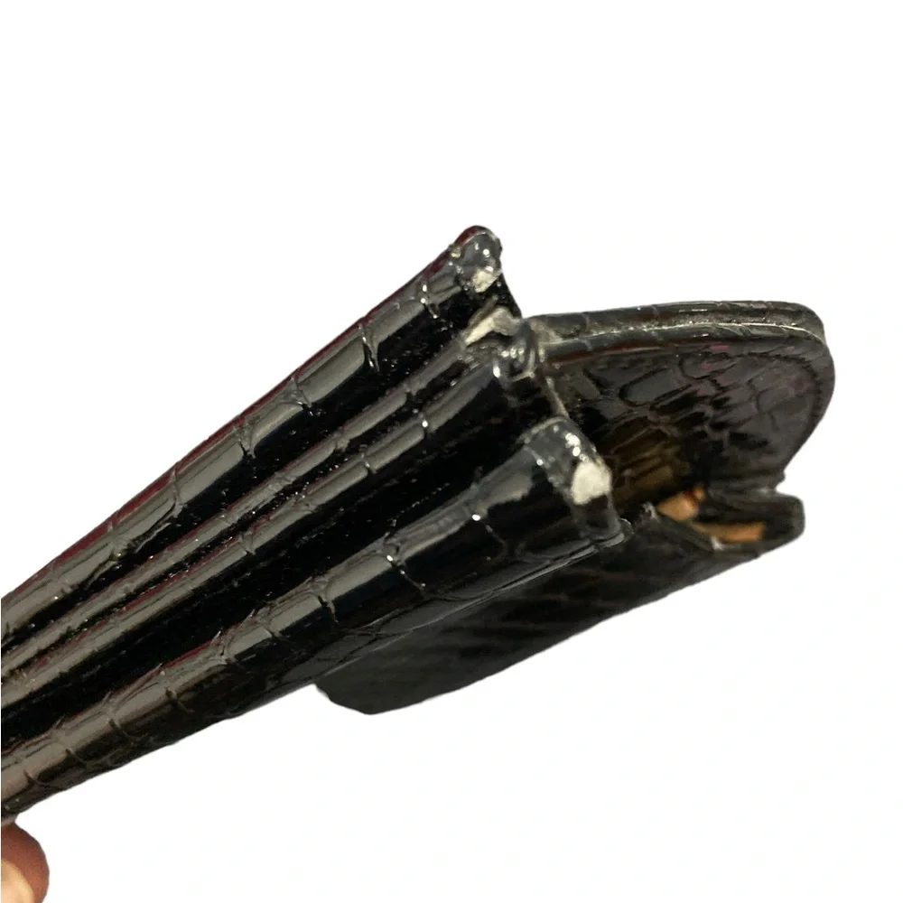 Double-sided black leather eyeglasses case. Holds 2 pairs of glasses. Used